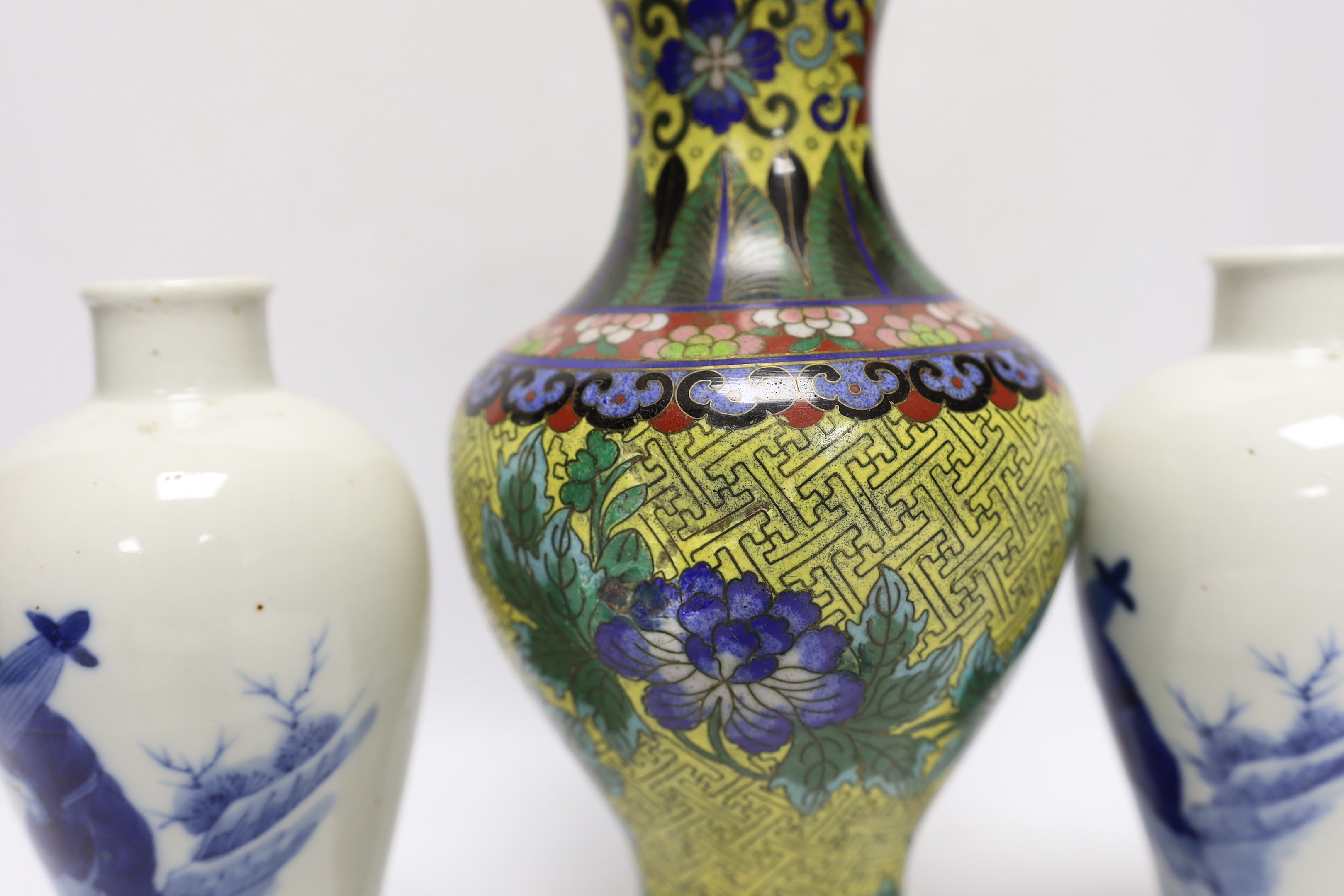 A pair of Chinese blue and white vases, c.1900 and a Chinese cloisonné enamel vase, largest 24cm high